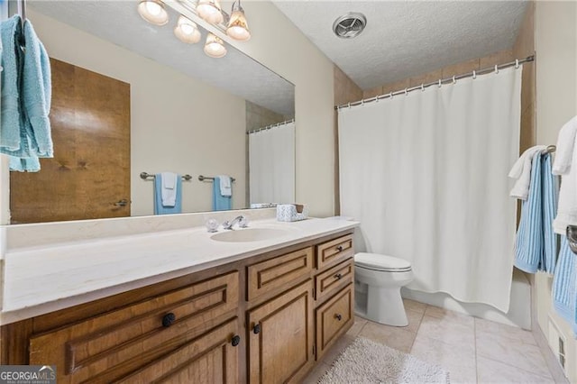 full bathroom with a textured ceiling, vanity, shower / tub combo with curtain, tile patterned flooring, and toilet