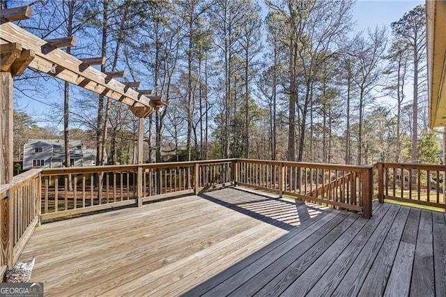 wooden deck with a pergola