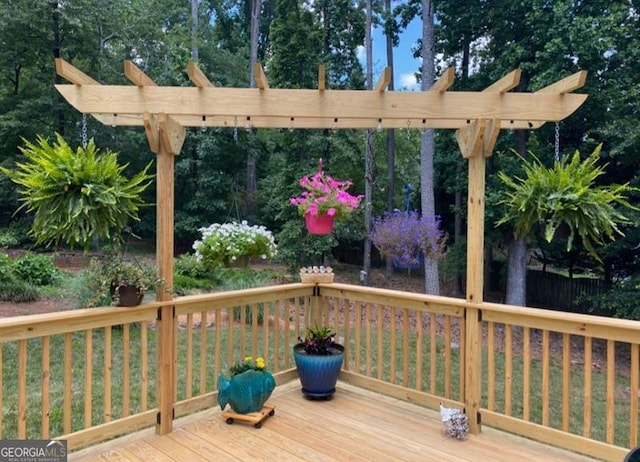 wooden deck with a pergola