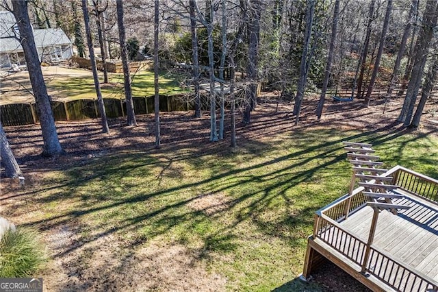 view of yard featuring a wooden deck