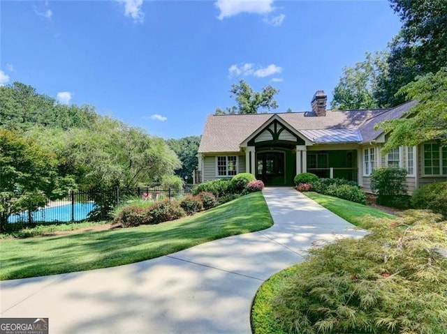 view of front of house with a front lawn