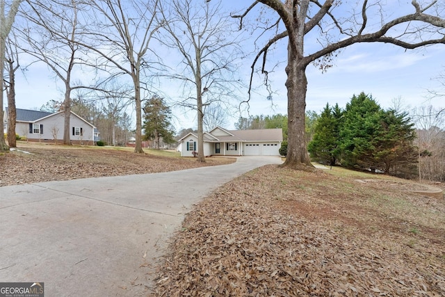 ranch-style home with a garage