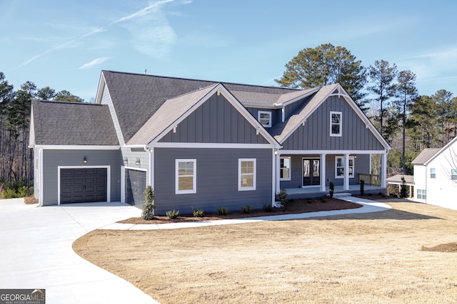 view of front facade featuring a garage and a porch