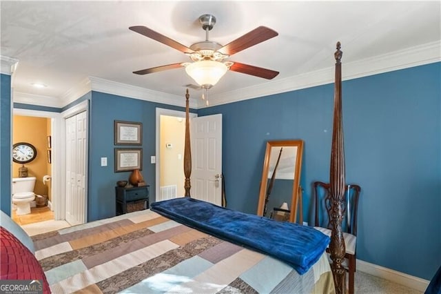 bedroom with carpet, ceiling fan, ornamental molding, connected bathroom, and a closet