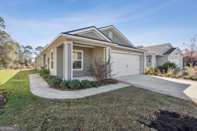 view of front facade featuring a garage and a front yard