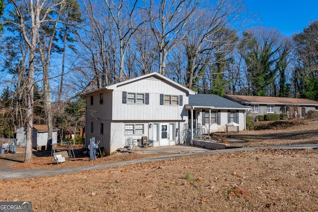 tri-level home featuring a storage unit