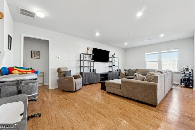 living room featuring light hardwood / wood-style floors