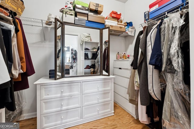 walk in closet featuring light wood-type flooring