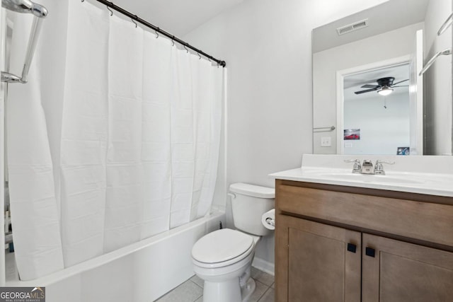 bathroom with tile patterned floors, vanity, toilet, and ceiling fan