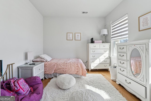 bedroom featuring light hardwood / wood-style flooring