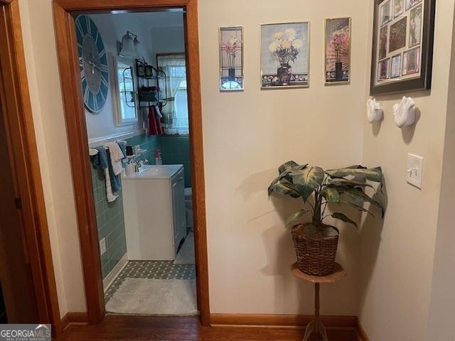 bathroom with vanity and hardwood / wood-style flooring