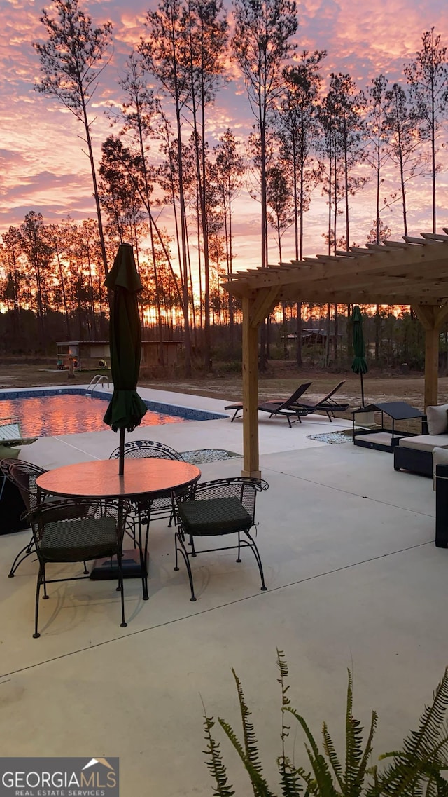 surrounding community featuring a pergola, a pool, and a patio area