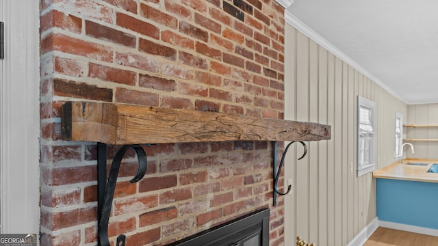 details featuring crown molding and wooden walls