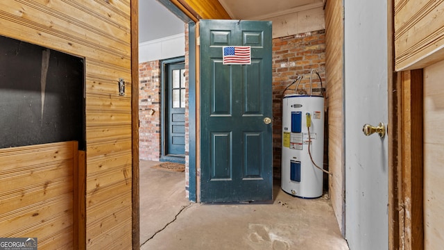 utility room with electric water heater