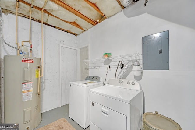 washroom featuring washing machine and clothes dryer, electric panel, and electric water heater