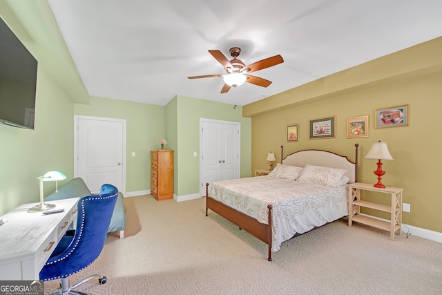 bedroom with light carpet, a closet, and ceiling fan