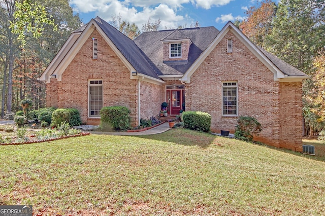 view of front of home with a front lawn