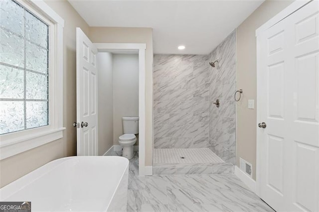 bathroom with separate shower and tub and toilet