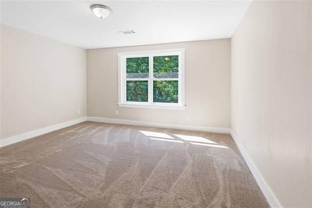 view of carpeted spare room