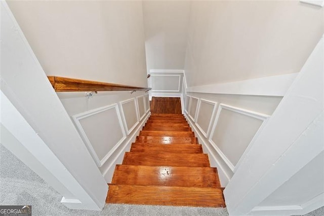 stairway with carpet flooring