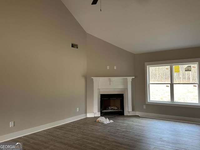 unfurnished living room featuring ceiling fan, wood-type flooring, and lofted ceiling