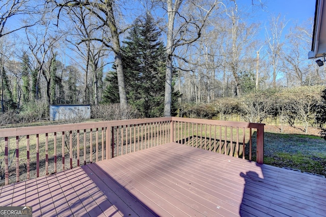 deck with a storage shed