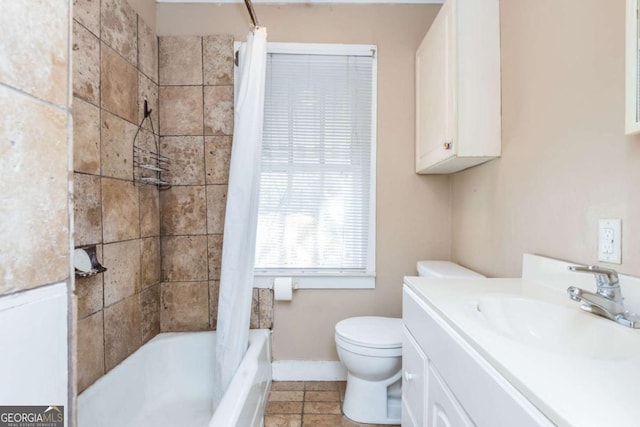 full bathroom featuring vanity, toilet, and shower / tub combo with curtain