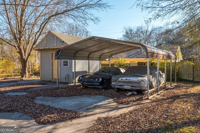 view of vehicle parking with a carport