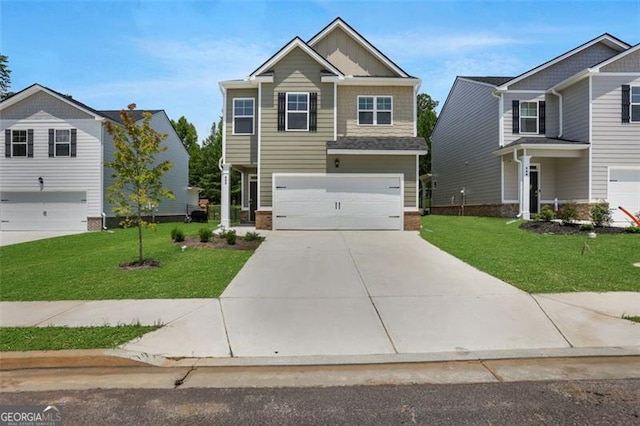 craftsman-style home featuring a front yard and a garage