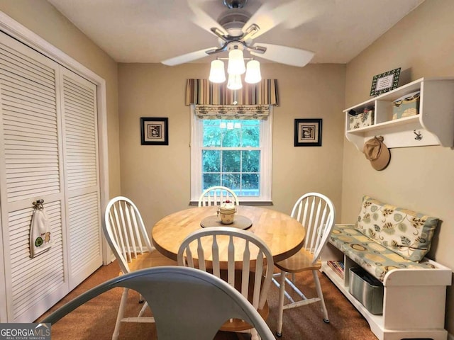 dining room featuring ceiling fan