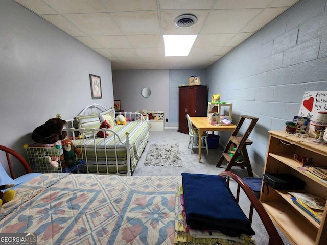 bedroom with a drop ceiling