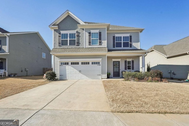 view of front of home with a garage