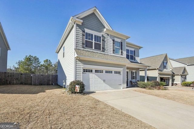 view of front of property featuring a garage