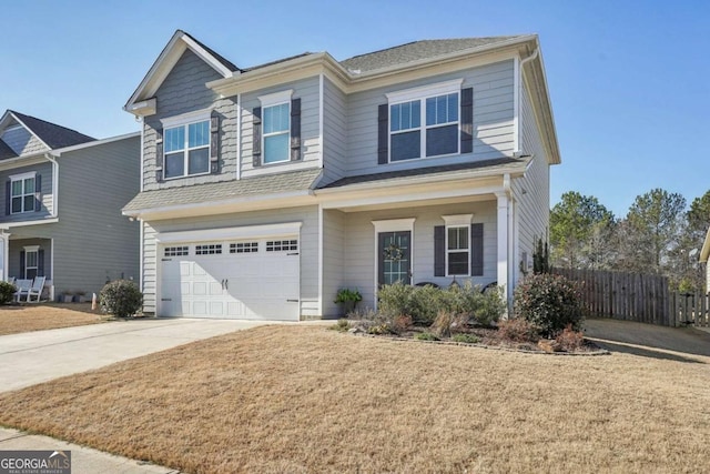 view of front facade with a front lawn and a garage