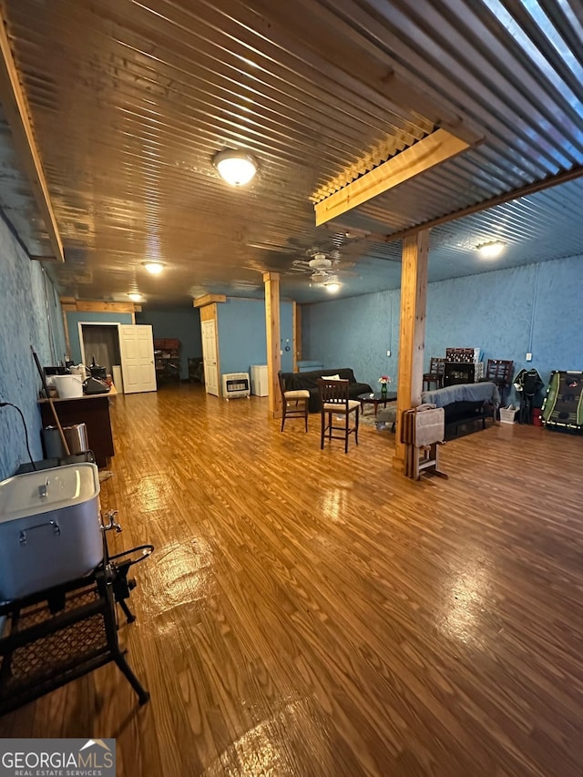 basement with hardwood / wood-style floors and wood ceiling