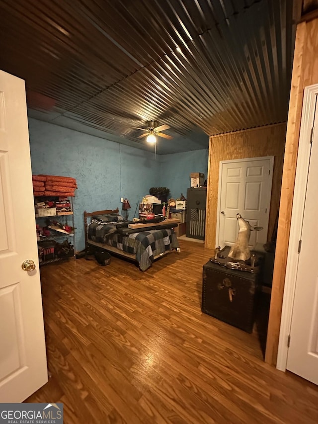 bedroom featuring wood-type flooring