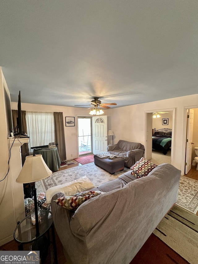 living room featuring ceiling fan