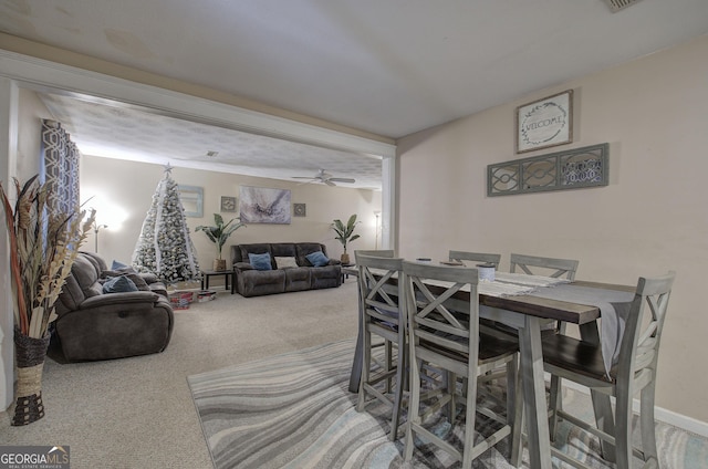 view of carpeted dining room