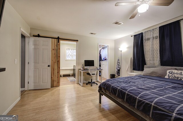 laundry area with separate washer and dryer and water heater