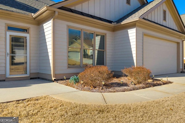 view of property exterior featuring a garage