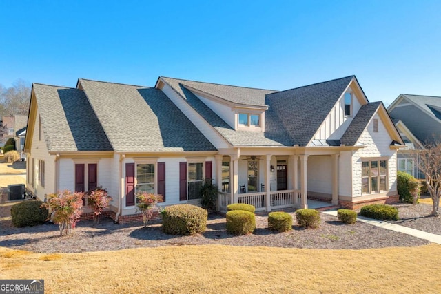 view of front of property featuring covered porch and central AC