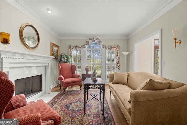 living room with ornamental molding and light hardwood / wood-style flooring