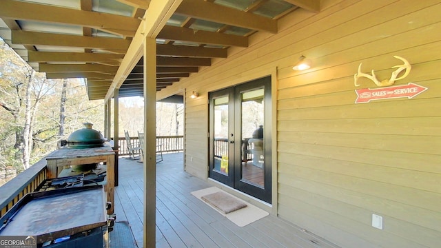 wooden terrace featuring french doors