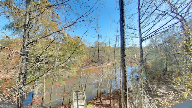 view of landscape featuring a water view