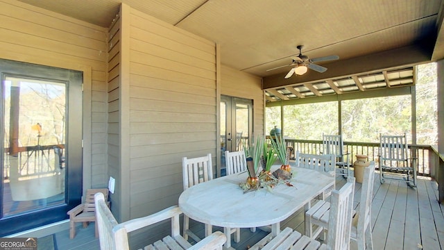 wooden deck with ceiling fan