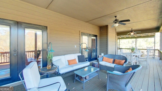 deck with french doors and an outdoor hangout area