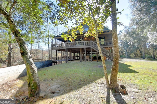 view of yard featuring a wooden deck