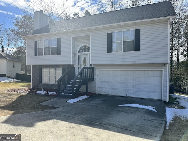 raised ranch with a garage