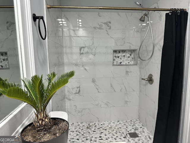 bathroom with a shower with curtain