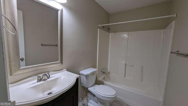 full bathroom with vanity, shower / bathtub combination, and toilet